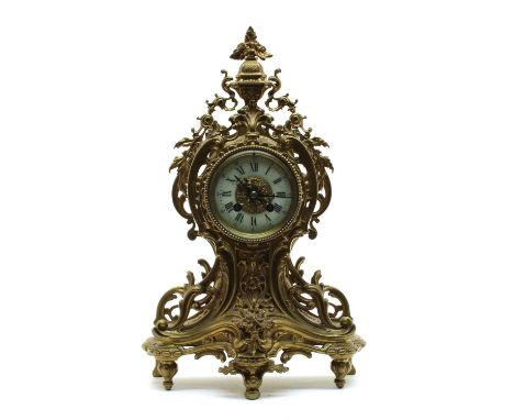 A 19th century French gilt brass mantel clock, the drum movement striking the half hours on a bell. 44cm highCondition report