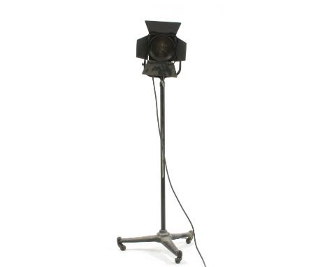 A Mole Richardson mid-century vintage theatre studio lamp, on an adjustable tripod base, 156cm high Condition report: In full