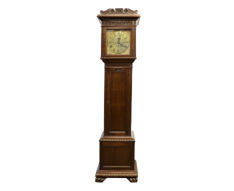 A mahogany longcase clock, late 19th to early 20th century, with three train movement striking on eight bells, the brass dial