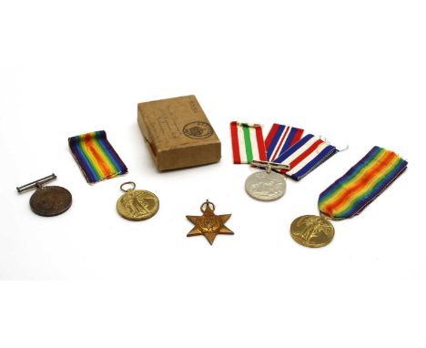 A collection of First and Second World War medals, to include a First World War and Victory medal, to 75601 Pte 1 F Ogle R.A.