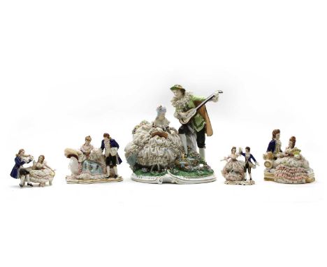 A large Meissen style Continental porcelain figure, possibly Dresden, depicting a man playing the lute beside a lady, 28.5cm 