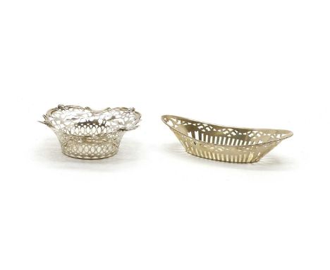 Two pierced sterling silver bon bon dishes, early 20th century, 13 x 13cm, the other oval dish 16 x 8cm (2)