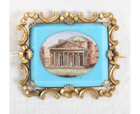 A 19th Century rectangular micro mosaic panel decorated view of the Pantheon with blue border and ornate yellow metal brooch 