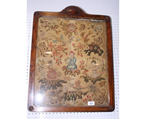 A 19th Century embroidered petit point panel worked kneeling Chinese figures, birds and flowers, 20" x 16", in walnut frame, 