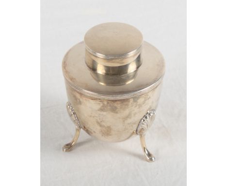 A silver tea caddy raised on three shell cast supports, 6.9oz troy approx