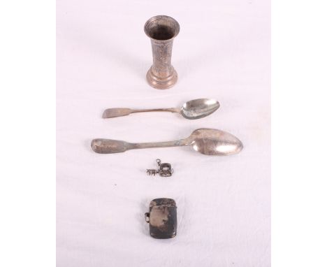 Two silver spoons, a silver specimen vase, a silver vesta case and a miniature silver sled charm