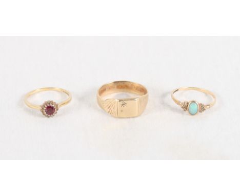 A gold and opal dress ring, a gold, ruby and diamond dress ring and a yellow metal signet ring