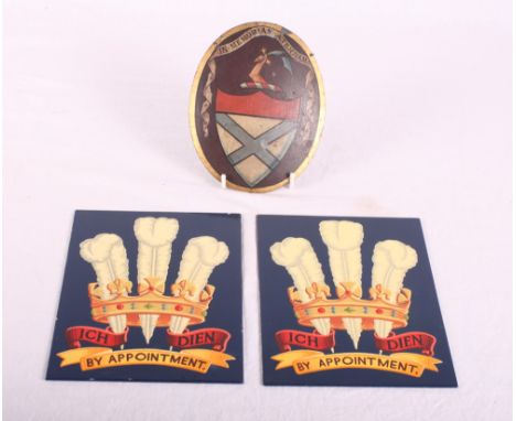 Two Prince of Wales Royal Warrant plaques, 7 1/2" x 5", and a 19th Century oval metal plaque painted armorial, 5 1/2" x 4 1/2