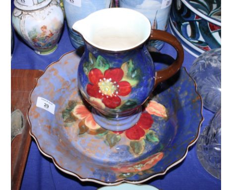 A Royal Doulton floral decorated jug and basin set, pattern number D6227, basin 12" dia
