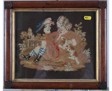 A 19th Century needlepoint panel of a child with a dog, 9" x 11", in mahogany split turned frame