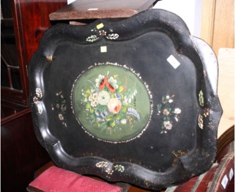A 19th Century rectangular black japanned metal tray with oval floral painted central panel, 30" x 24"