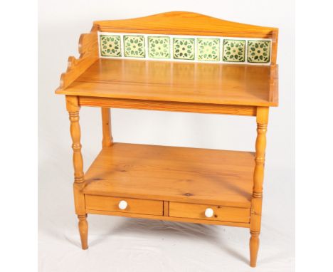 A pine washstand with tile back, 33" wide