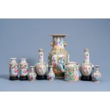 Eight Chinese Canton famille rose vases and a teapot and cover, 19th C.