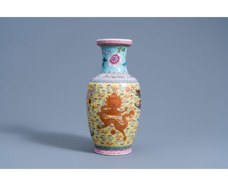 Full title: A Chinese famille rose yellow ground 'dragons chasing the pearl' vase, Qianlong mark, 20th C.Description: H 35,5 