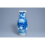 A Chinese blue and white 'dragon and carp' vase, 19th C.