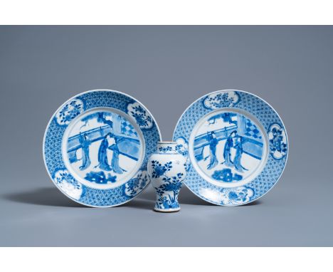 Full title: A pair of Chinese blue and white plates with ladies in a garden and a vase with floral design, KangxiDescription: