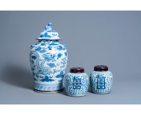 Full title: Two Chinese blue and white 'Xi' jars and covers and a 'dragons chasing the pearl' vase and cover, 19th/20th CDesc