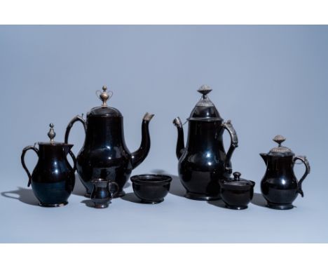 Full title: Five various black glazed Namur pottery jugs and two bowls, some pieces silver mounted, 18th C.Description: H 32 