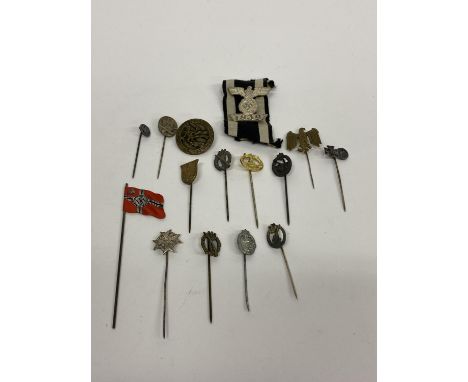 A German Panzer Division cap badge and other badges, including a U-Boat stick pin, a Heer Civil Eagle stick pin and a 1939 Ba
