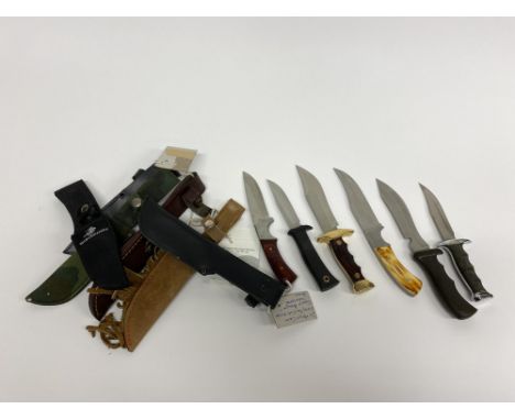 Three Spanish Camp/Hunting knives, two Andujar and Winchester camp knives and another with bone handle
