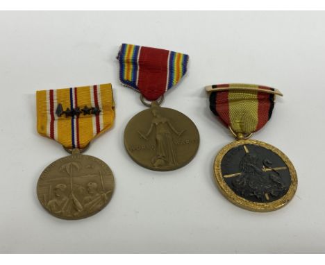 A Spanish Civil War medal, 1936-39, a United States of America Asiatic Pacific Campaign medal and a Freedom From Fear and Wan