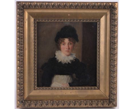 Early 19th century oil on wood panel, portrait of a woman, unsigned, 9" x 8.5", framed.