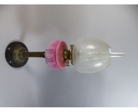 A Victorian Brass Oil Lamp with Opaque Pink Glass Reservoir and Etched Shade, 70 cm High 