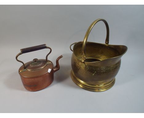 A Victorian Copper Kettle and A Brass Helmet Shaped Coal Scuttle 