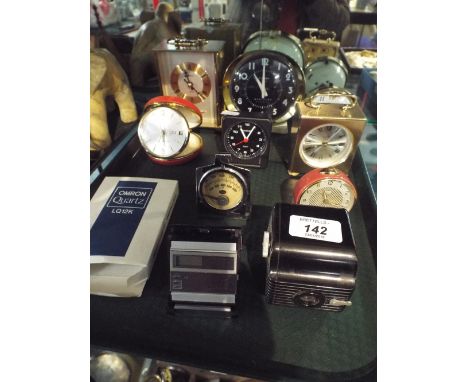 A Collection of Mid 20th Century Alarm Clocks, Camera Etc 