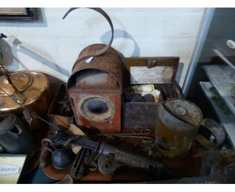 A Tray Containing Vintage Road Lamp, Various Tools, Oil Canister, Vintage Padlocks, First Aid Kit Etc