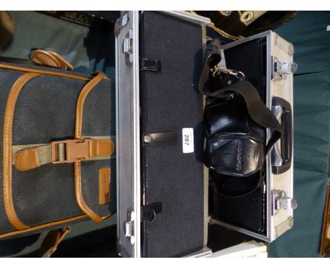 A Camera Case Containing Olympus 35 mm Camera, Lenses and Accessories together with a Miranda Camera Case