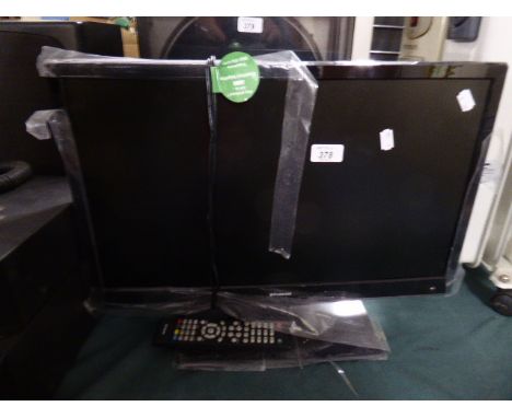 A Polaroid Flat Screen TV and Remote 