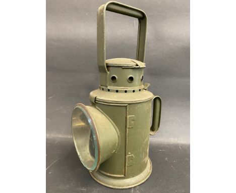 A Bladon military issue hand held railway lamp, dated 1954.