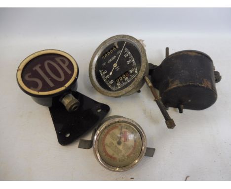 A rear mounted 'Stop' light, a Jaeger 0-80mph speedometer, a British Berkshire wiper motor etc.