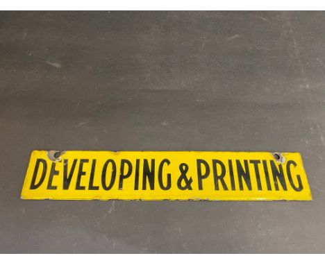 A rectangular double sided enamel sign for developing and printing, from a Kodak or Selo frame sign, 14 x 2 1/2".