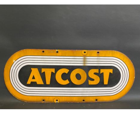 An Atcost enamel sign, 30 x 12".