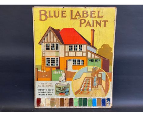 A Blue Label Paint pictorial showcard showing both the interior and exterior of a house, plus a colour swatch along the botto
