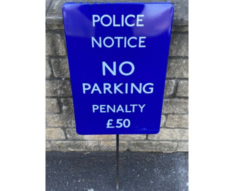 A 'Police Notice No Parking Penalty £50' enamel sign by Garnier, in excellent condition, mounted on a spike, the sign measuri