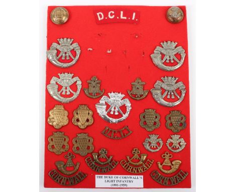 Selection of Badges of the Duke of Cornwall Light Infantry, including scarce pair of early pattern collar badges, anodised re