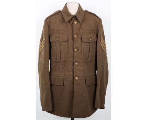 British 1922 Pattern Service Dress Tunic, fine example of the khaki wool four pocket service dress tunic with brass general s