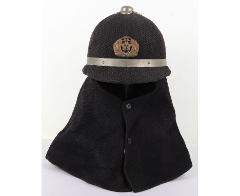 Japanese Civil Defence Firefighters Helmet, interesting example of the black cloth covered wicker framed helmet with its orig
