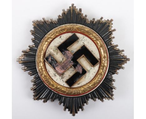 WW2 German Deutsche Kreuz (German Cross) in Gold, untouched example of the metal breast award with gilt wreath having 1941 da