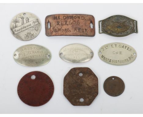 Grouping of Identity Discs of Worcestershire Regiment Interest, consisting of a very fine example fashioned from a silver coi