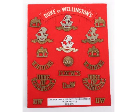 Board of Badges Relating to the Duke of Wellingtons West Riding Regiment, including variations of the regimental cap badge, c