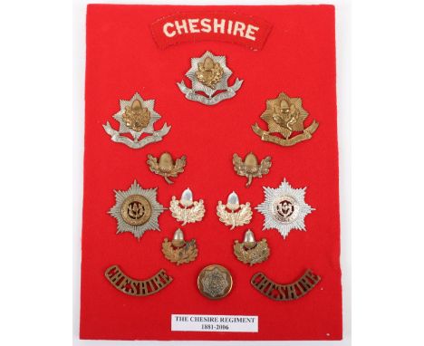 Board of Badges Relating to the Cheshire Regiment, including variations of the regimental cap badge, collar badges, shoulder 