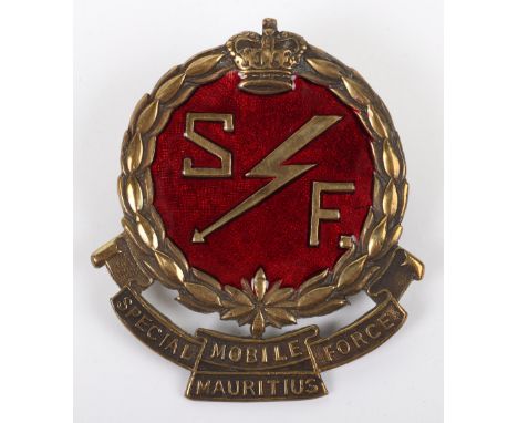 Rare Special Mobile Force Mauritius Cap Badge, die stamped brass badge with red enamel centre. Two lug fittings to the revers
