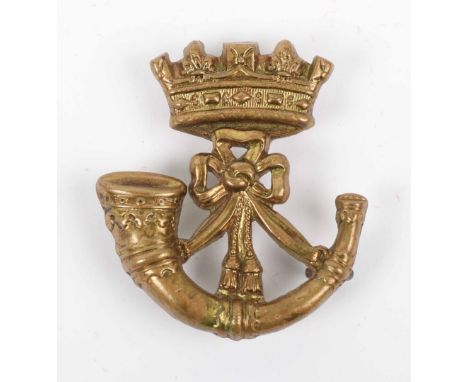 Scarce Victorian Duke of Cornwall’s Light Infantry Cap Badge, being brass coronet above strung bugle with three lug fittings 