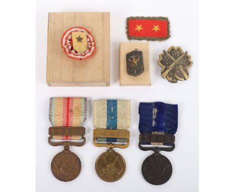 WW2 Japanese Medal &amp; Insignia Grouping, consisting of WW1 service medal, Russo Japanese war medal, Manchuria Incident med