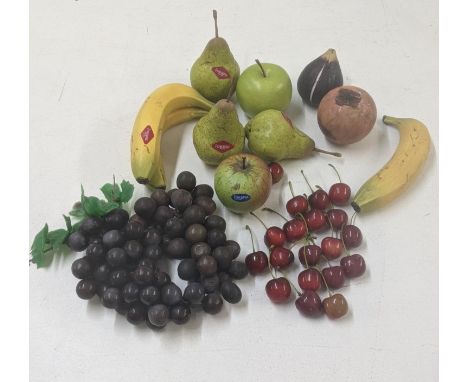 A collection of Penkridge model fruit to include three pears, bananas and an apple together with other model fruit examplesLo