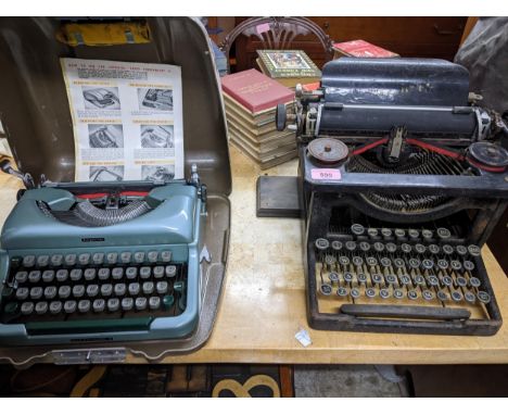 A vintage L C Smith and Bros typewriter, and a metal cased mid-century Imperial Good Companion typewriter Location:If there i
